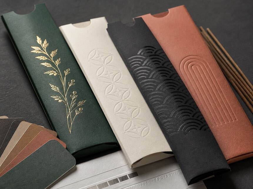 Gold foil, blind embossing, spot UV and debossing on incense packaging proofs