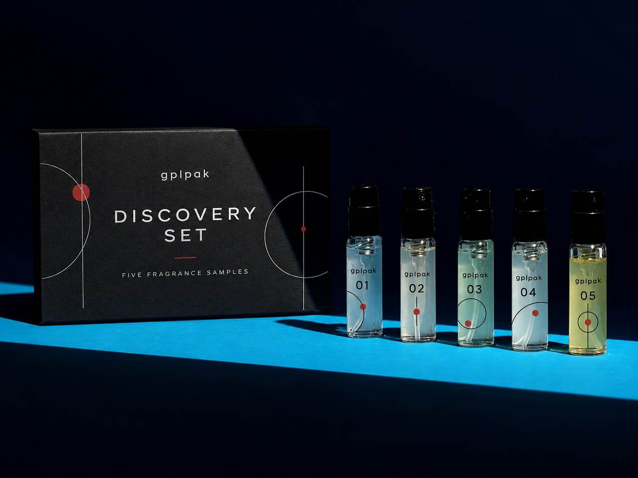 Custom discovery set perfume box with navy rigid lid and fragrance sample vials