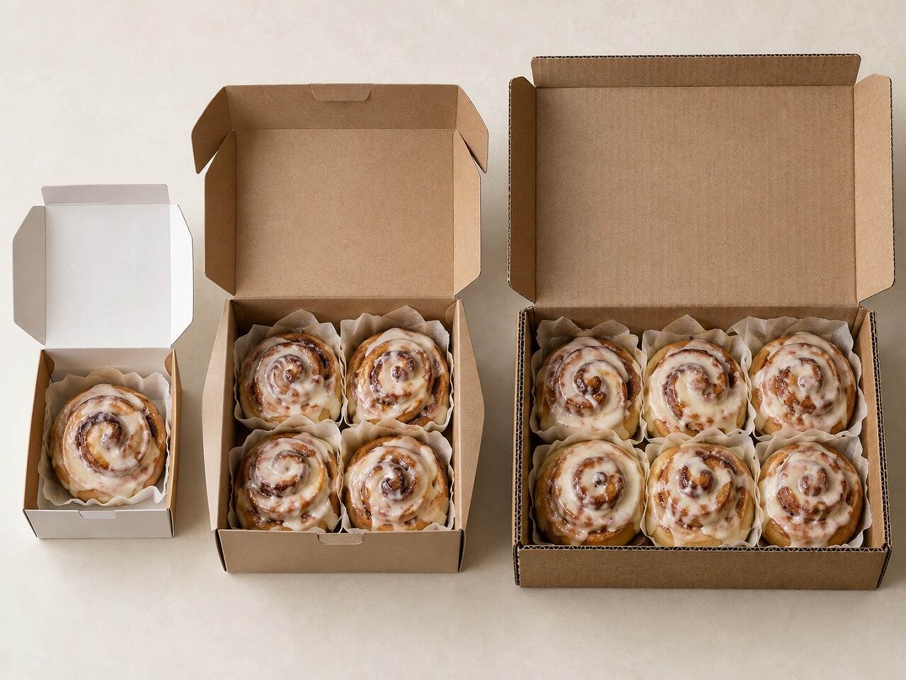 Comparison of single-roll folding carton, four-roll bakery carton and six-roll corrugated delivery box